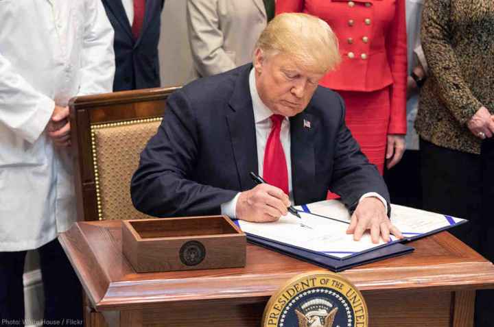 President Donald Trump signing an executive order